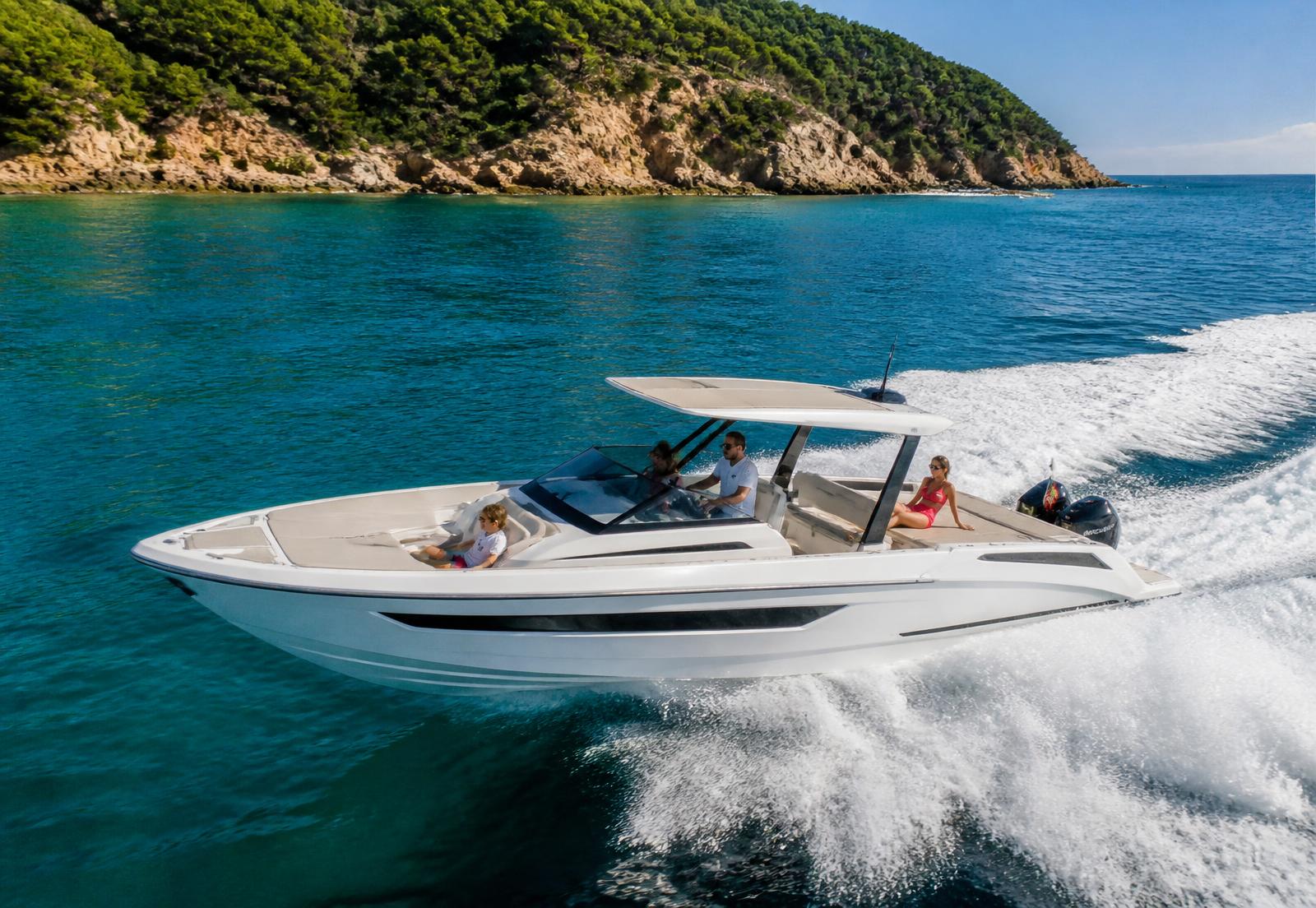 Family boat cruising over turquoise Mediterranean water